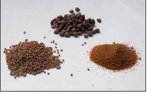 Example of fish feed in pellets and powder used for various size classes of fish