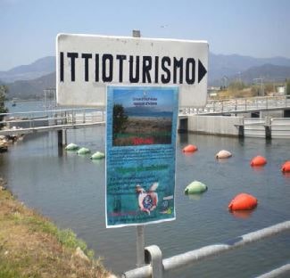A sign indicating tourism fishing activities in the Tortoli lagoon (Sardinia, Italy)