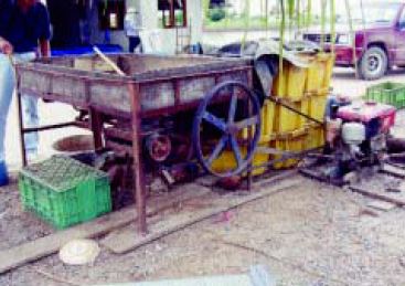 Some farmers make their own equipment for extruding farm-made feeds